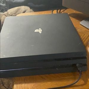 I’m selling a black PS4 pro/ games & controller